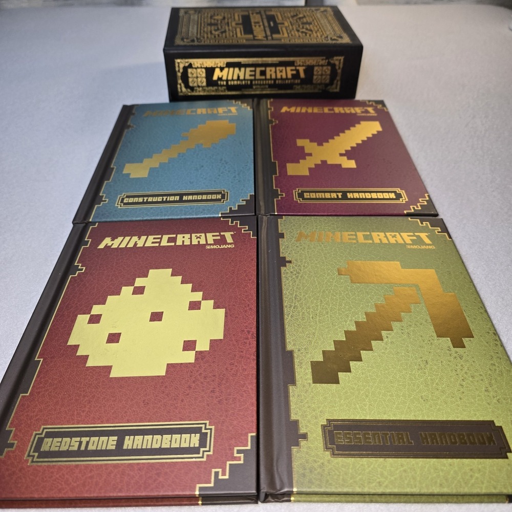 Pristine Minecraft Handbook Box Set - 4 Hardcover Guides - Mojang Scholastic...